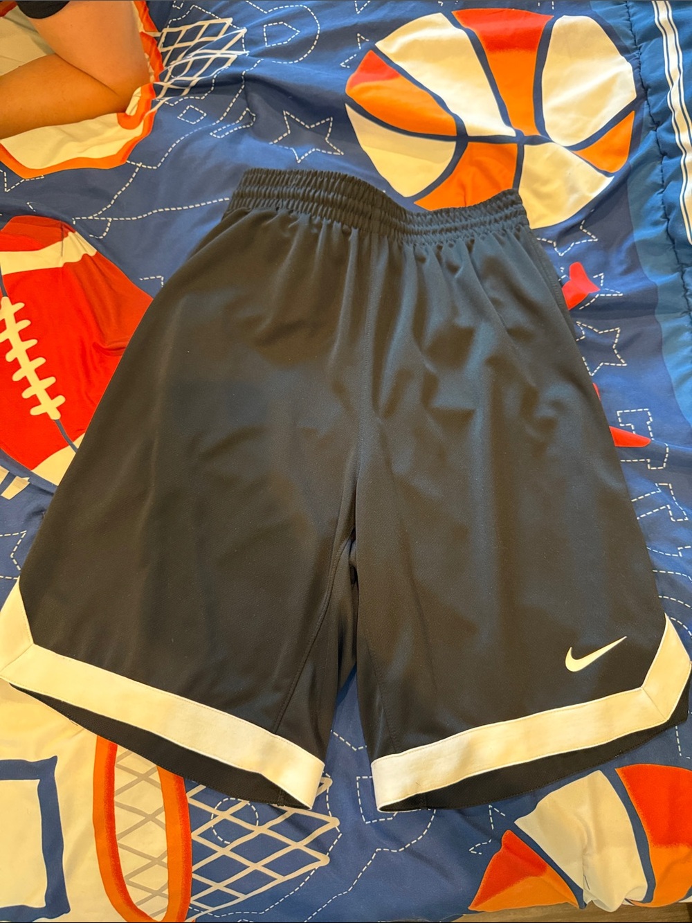 Nike Men’s Black Athletic Shorts with White Hem and Swoosh
